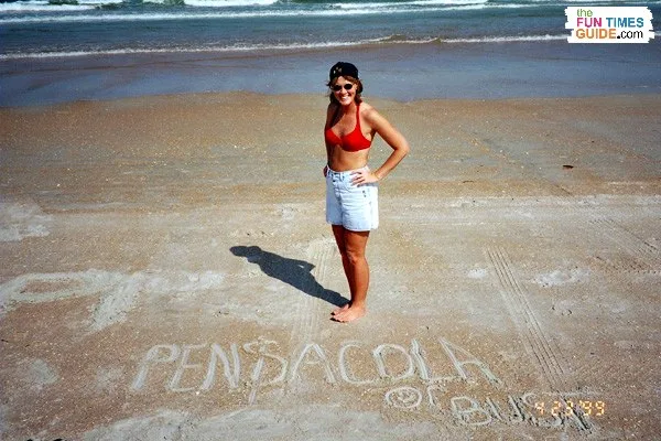 Pensacola or Bust drawn in the sand 