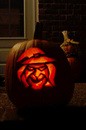 A pumpkin we carved of a witch.